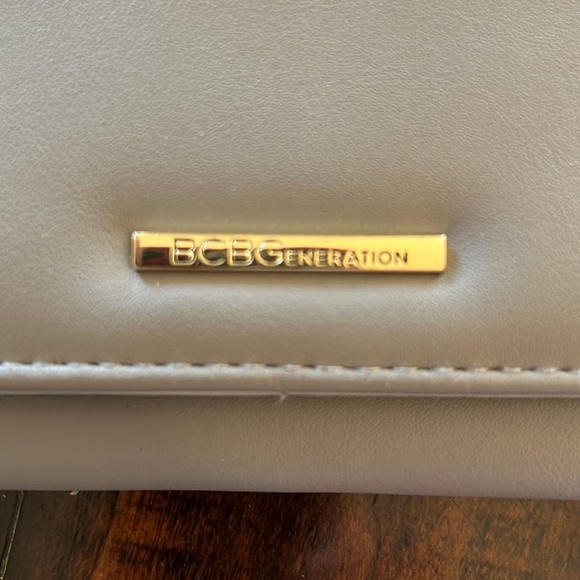 NWOT BCBGeneration wallet. Gray with gold hardware 13 pockets - Picture 2 of 6